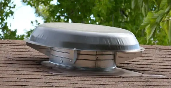 attic fan installation services with low-profile roof ventilation unit in Oklahoma City, OK