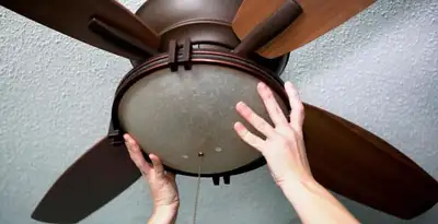 Ceiling fan repair and reinstallation on ceiling mount in Oklahoma City, OK