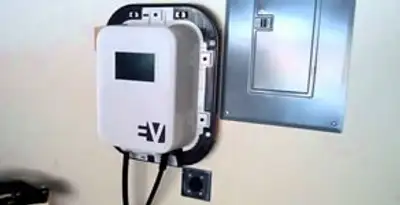 Electric car charger installation with wall-mounted EV charging station in Oklahoma City, OK