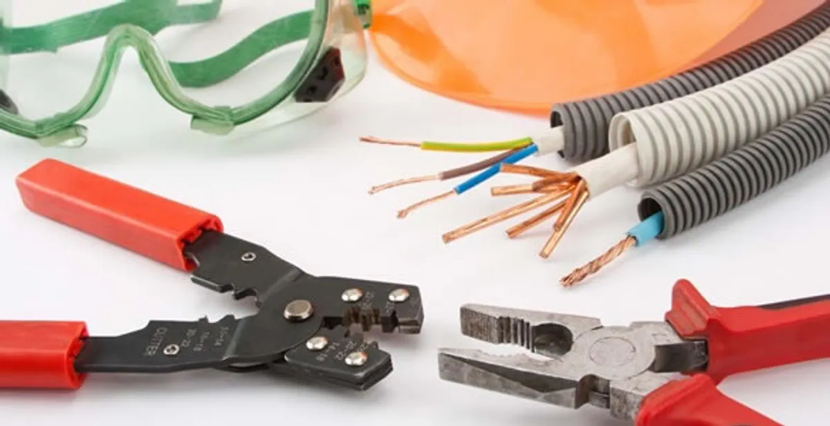 Electrical wiring repair with professional tools and safety equipment in Edmond, OK