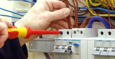 electrician services performing professional electrical panel wiring and connections in Oklahoma City, OK