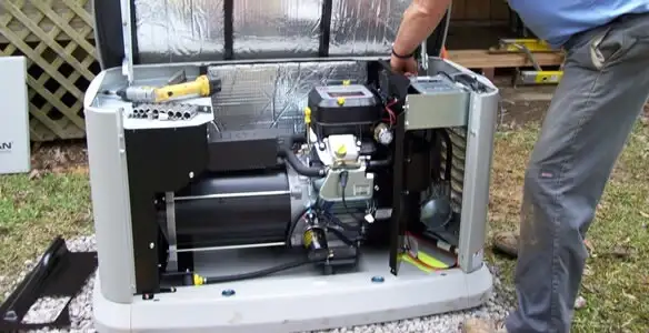 generator installation service showing technician connecting and configuring generator components in Oklahoma City, OK