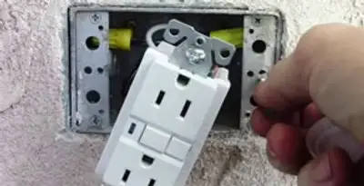 gfci circuits service showing installation of a ground fault circuit interrupter outlet by licensed electricians in Oklahoma City, OK