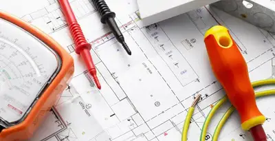 licensed electrician planning and testing electrical systems using professional tools in Oklahoma City, OK