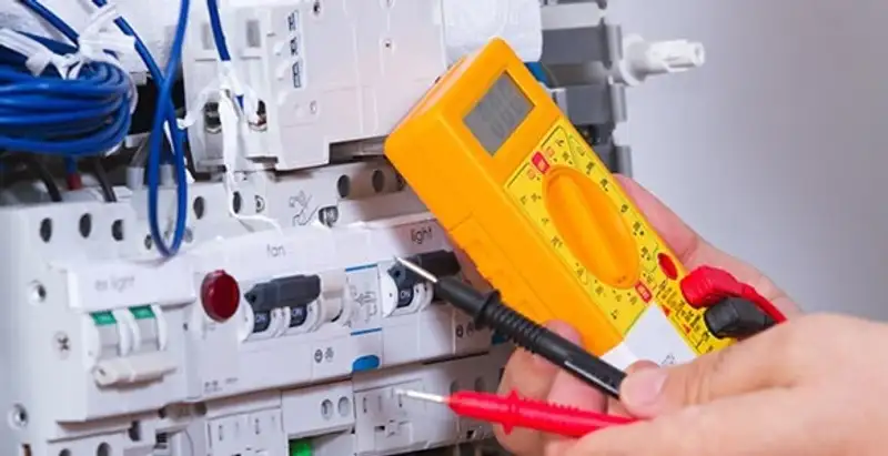 Residential electrician testing home electrical panel for safety and performance in Oklahoma City, OK