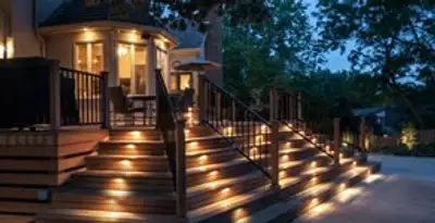 Residential electrician installing outdoor lighting for home safety in Oklahoma City, OK