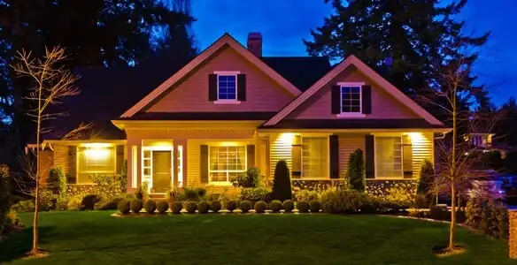security light installation services illuminating a residential exterior at night in Oklahoma City, OK