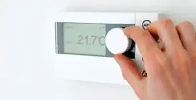 Thermostat installation service with professional adjusting temperature control in Oklahoma City, OK